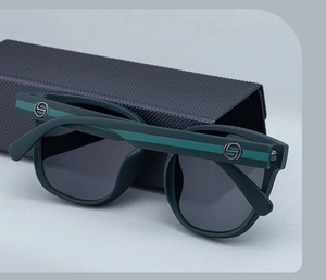 Detail of matte green polarized sunglasses with striped temples and a black hard case