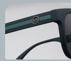 Macro view of matte dark green polarized sunglasses frame with metal logo and stripe detail