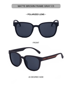 Detail of matte brown square polarized sunglasses with grey lenses and striped temples