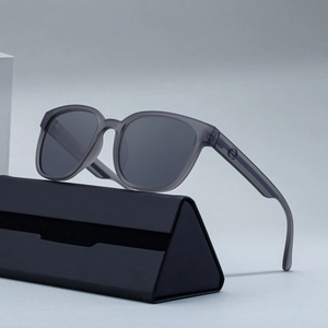 Square polarized sunglasses for men with grey frame and matching leather triangle case