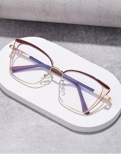 Detail of rose gold cat-eye frame with purple acetate and size specs 51-17-143