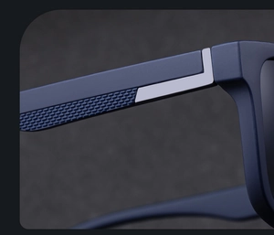 Detail macro view of matte navy blue sunglasses frame with silver metal hinge and textures