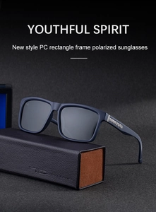Close-up of rectangular polarized sunglasses featuring silver metal temple accents