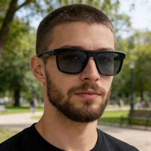 Classic men's square polarized sunglasses with black frames and grey lenses outdoors