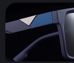 Macro detail of blue sports sunglasses temple with hexagonal anti-slip texture and metal insert