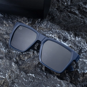 Polarized square sunglasses in navy blue matte finish with a black leather case
