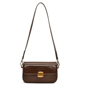Sac bandoulière rétro en cuir ciré marron avec fermoir rotatif doré et fine sangle