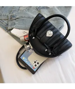 Interior view showing the large storage capacity of this black lychee leather crescent bag