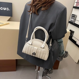 Chic off-white quilted hobo bag with silver lock and detachable strap for women