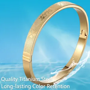 Waterproof gold titanium steel bangle with LOVE engraving and floral pattern design