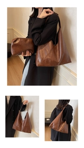 Detail of dark brown leather tote bag with vintage texture and matching small pouch