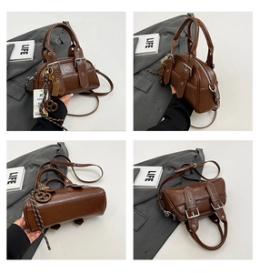 Vues détaillées du sac bowling marron vintage en similicuir avec double poignée