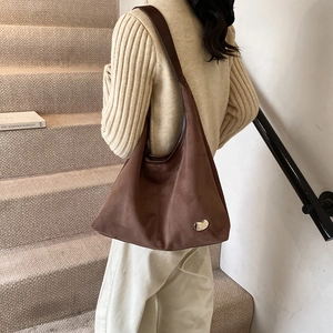 Large dark brown suede tote bag for women with bean-shaped metal buckle on the shoulder