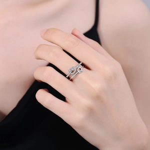 Adjustable silver heart knot ring with sparkling zircon pavé for women in a sleek dual-layer style