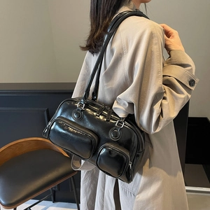 Vintage black oil wax leather shoulder bag with multi-pocket design and silver hardware