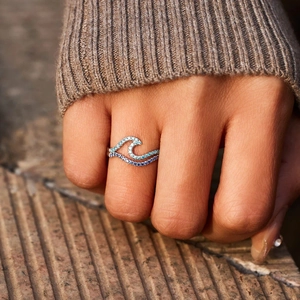 Double-layer wave ring for women with gradient blue stones on a silver-tone band