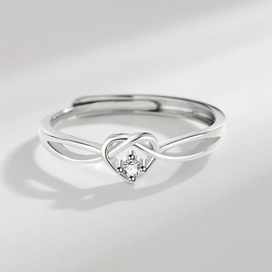Adjustable silver heart ring with sparkling crystal stone and hollow band design