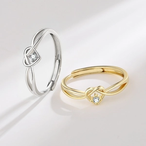 Minimalist adjustable heart knot rings with sparkling zircons in gold and silver finish