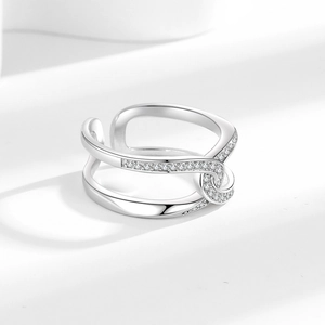 Adjustable silver knot ring with sparkling zircon stones in a double cross design