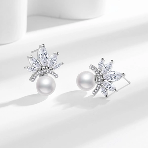 Elegant pearl stud earrings with lotus crown design and marquise-cut cubic zirconia crystals