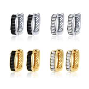 U-shaped hoop earrings set with baguette cut cubic zirconia in gold and silver finish
