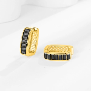 U-shaped gold rectangle hoop earrings with black baguette stones in a minimalist style