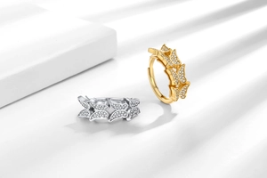 Detailed view of adjustable double-layer butterfly rings with shimmering cubic zirconia