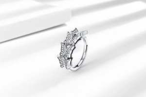 Macro shot of silver butterfly ring featuring shimmering micro-paved cubic zirconia stones