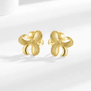 Eleganti orecchini a perno dorati a fiocco in stile francese con design cavo minimalista