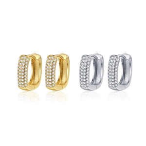 U-shaped huggie earrings in gold and silver finish with pavé set zircon crystals