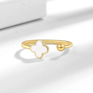 Elegant gold clover open ring with white enamel inlay and polished metal bead