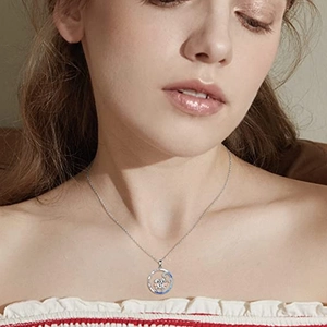 Fashionable otter pendant necklace with rose gold figure and blue accents for women
