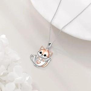 Cute fox in a teacup pendant necklace with two-tone rose gold and silver metal finish