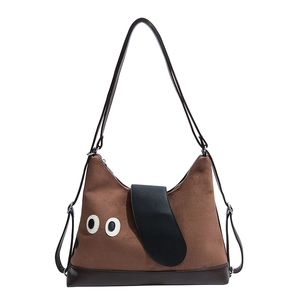 Borsa tote cane cartone animato in pelle scamosciata marrone con tracolla nera