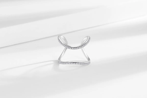Detailed view of silver double-layered open ring with micro-pave cubic zirconia crystals