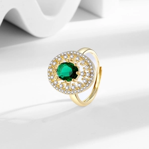 Luxurious gold ring with large green oval gemstone and pavé zircon halo for women