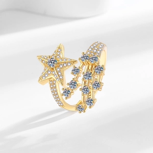 Luxe gold shooting star open ring with micro-paved zircons and stellar trail design