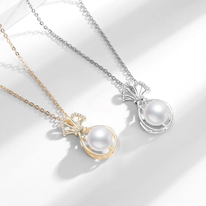 Elegant gold and silver lucky bag freshwater pearl pendant necklaces for women