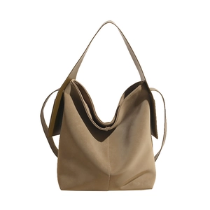 Minimalist khaki bucket bag with wide strap for casual commuting and large capacity