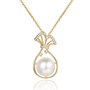 Elegant gold chain necklace featuring a large round freshwater pearl pendant with zircons