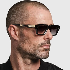 Men's square black sunglasses with gold metal temples and gradient grey lenses