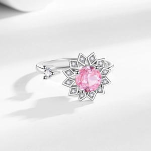 Bague rotative tournesol réglable avec pierre rose et zircon en métal argenté