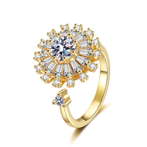 Adjustable gold flower ring with baguette and round zircons in a sunburst sunflower design