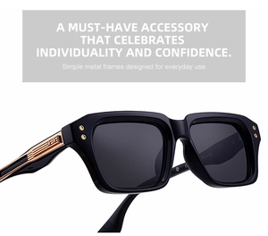 Detail view of square black sunglasses showing golden metal stripes on the temple hinges