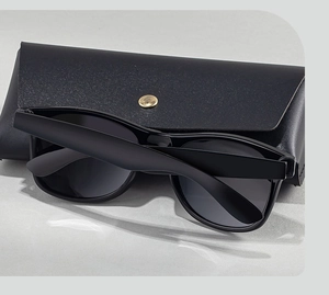 Square polarized sunglasses for men with a black pebble grain leather case and metal snap