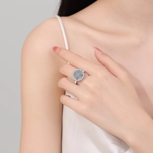 Adjustable silver clover spinner ring with sparkling crystals for anxiety relief