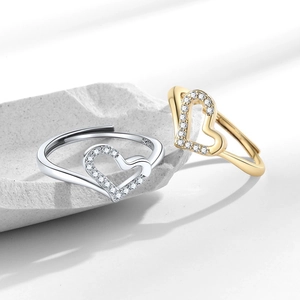 Vintage heart-shaped S925 silver and gold rings with pavé cubic zirconia accents
