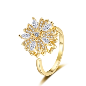 Adjustable gold flower ring featuring shimmering zircons and a rotating clover design