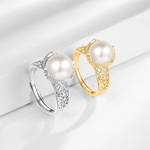 Baroque hollow carved open rings in gold and silver finish with large round white pearls