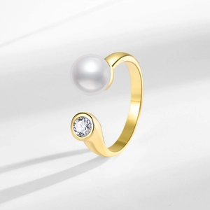 Minimalist gold adjustable ring with round white pearl and sparkling round zircon stone